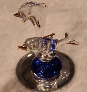 Like-New Glass Dolphins